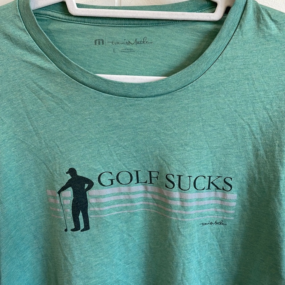 Travis Mathew golf sucks shirt